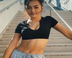 She has a piercing in her belly button and also in her nasal septum.